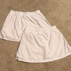2 white Nike Tennis Skirts